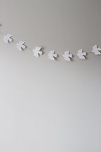paper doves on a string