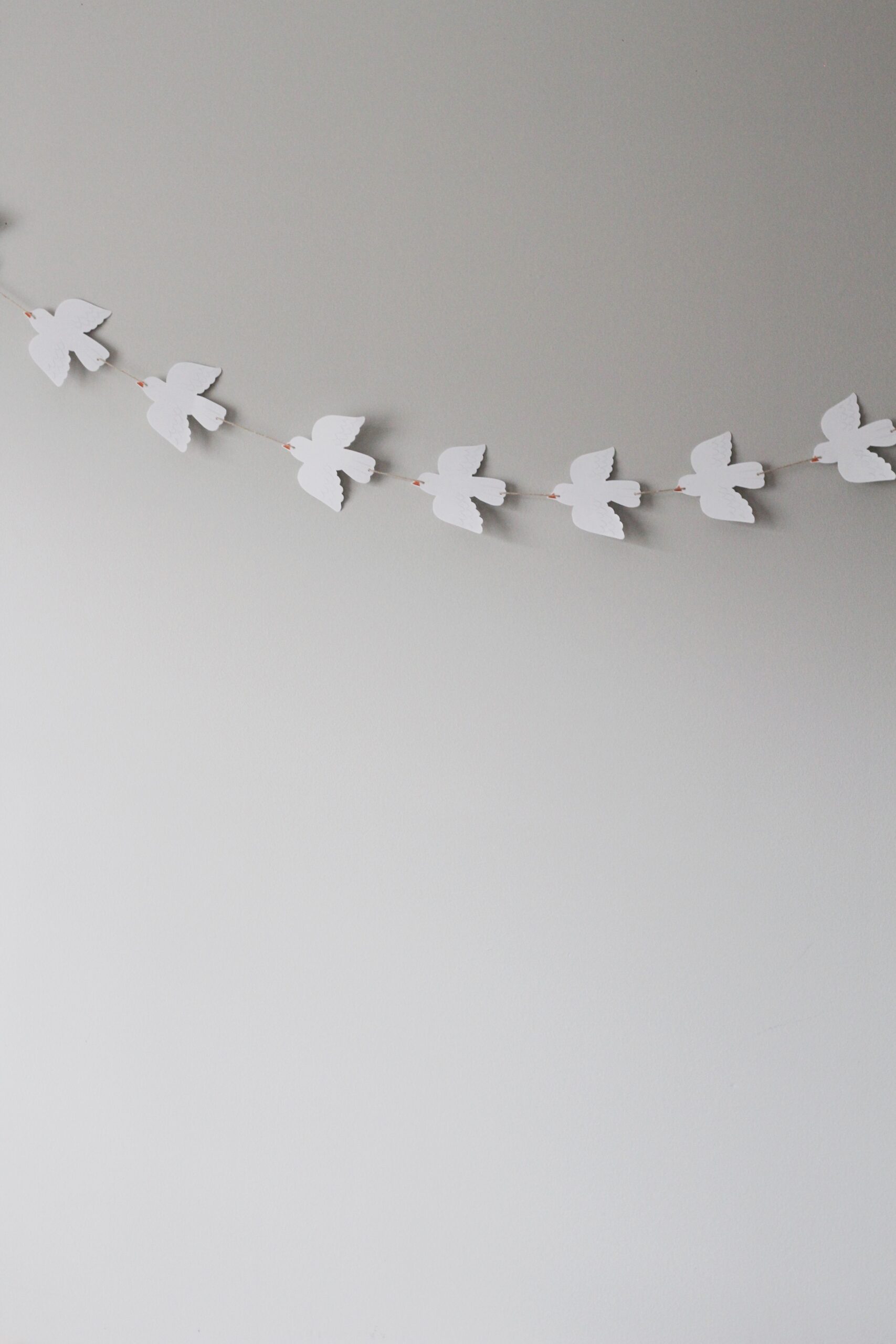 paper doves on a string