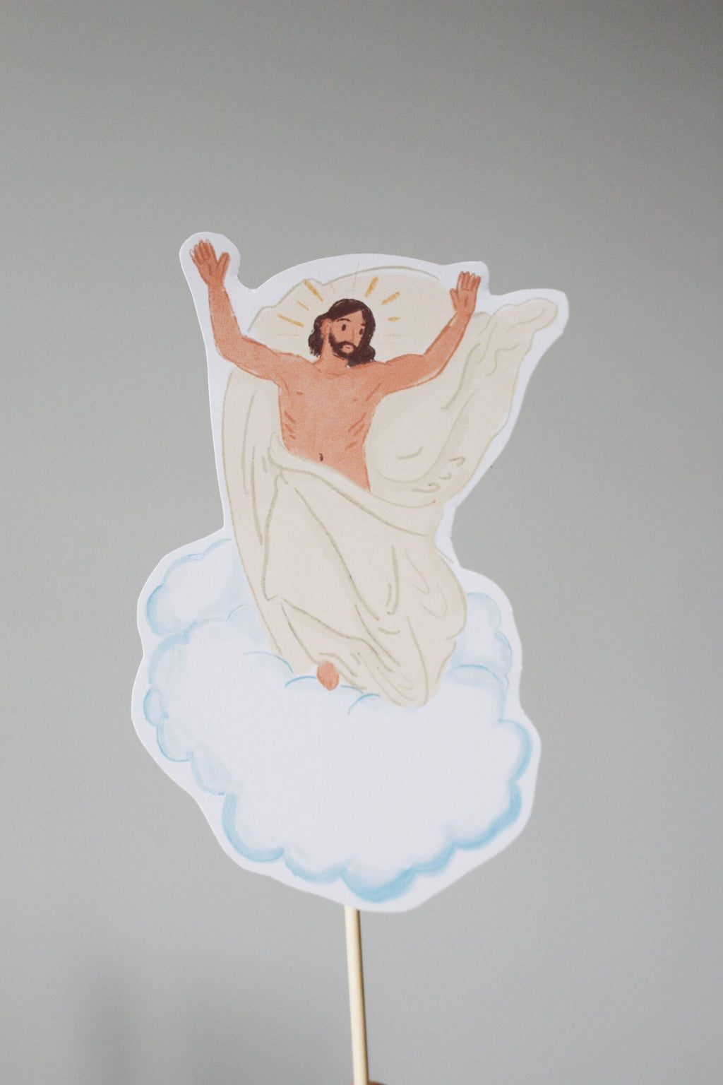 Printed illustration of Jesus ascending into heaven on a cloud