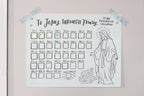 Marian Consecration Countdown chart with stickers on it
