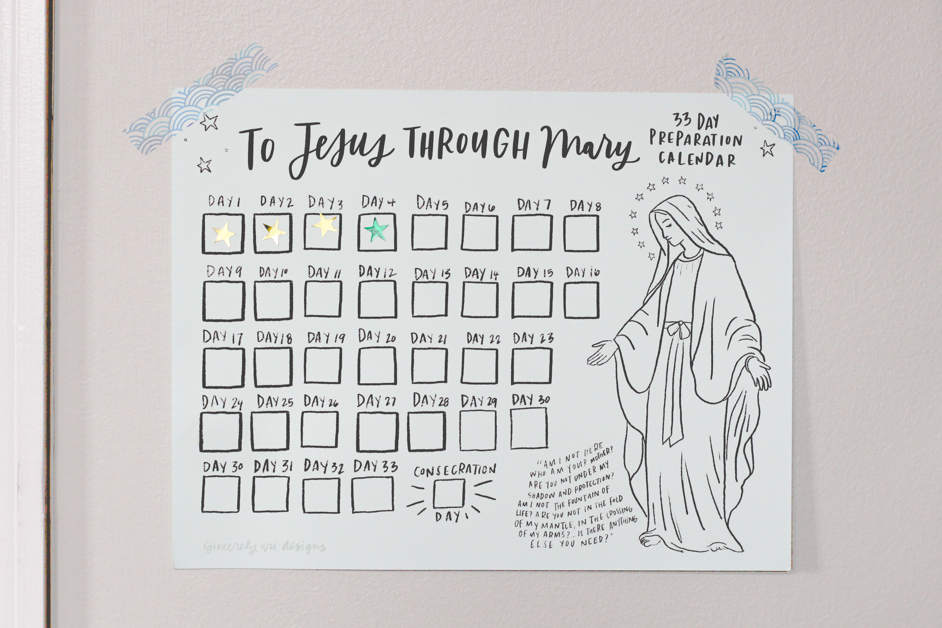 Marian Consecration Countdown chart with stickers on it